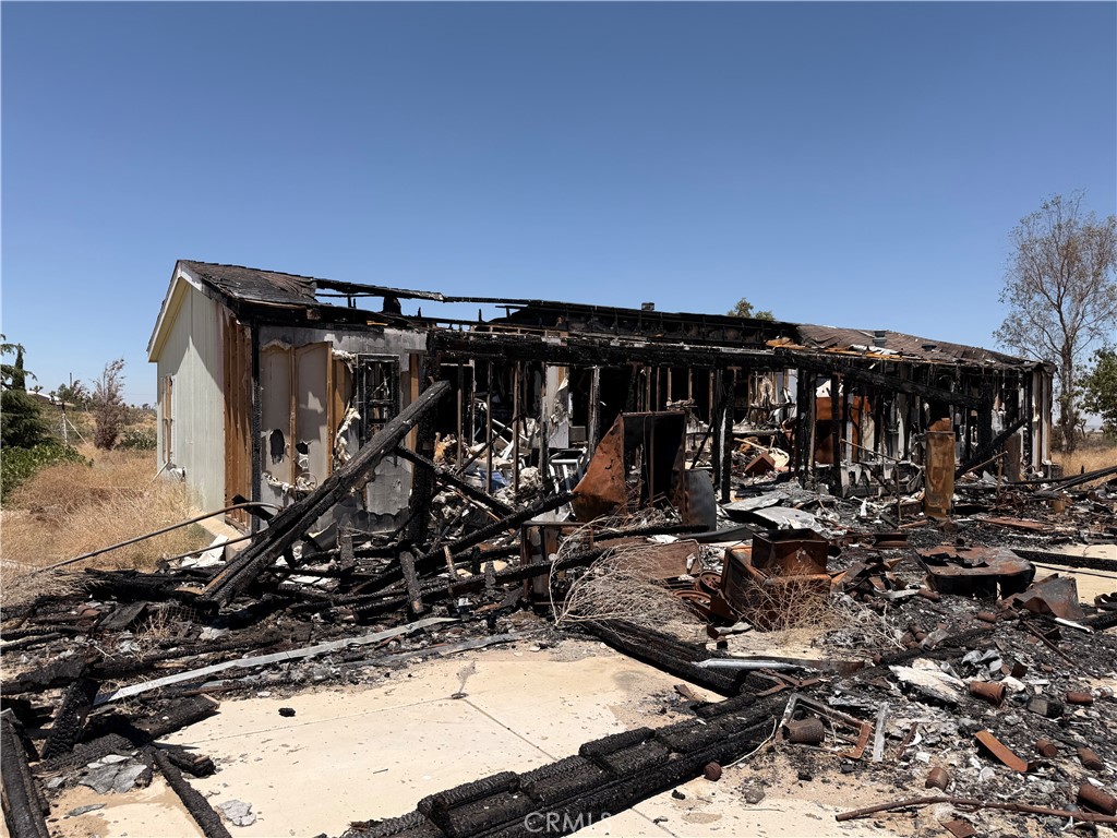 12225 Lager Road Phelan, CA 92371 - Photo 8 of 18 Severe fire damage to back of house