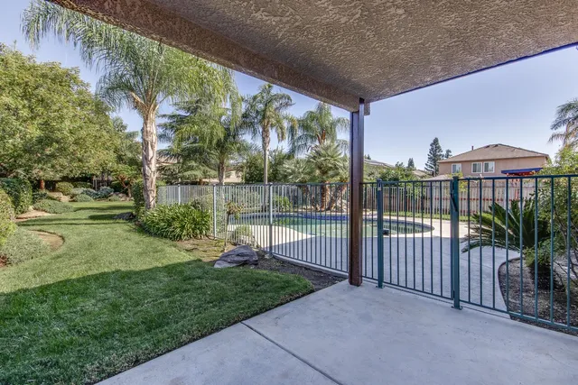 a view of a porch with a yard
