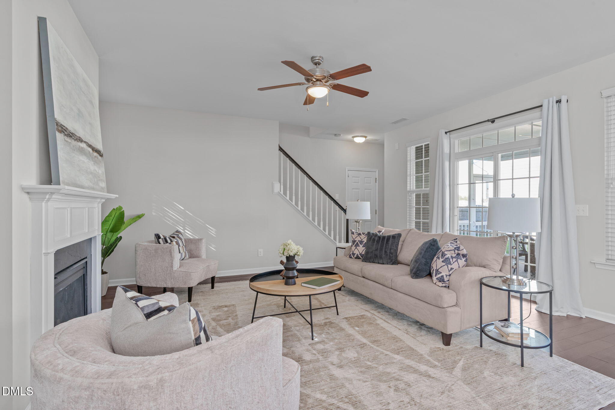 1432 Palace Garden Way Raleigh, NC 27603 - Photo 15 of 42 a living room with furniture and a wooden floor