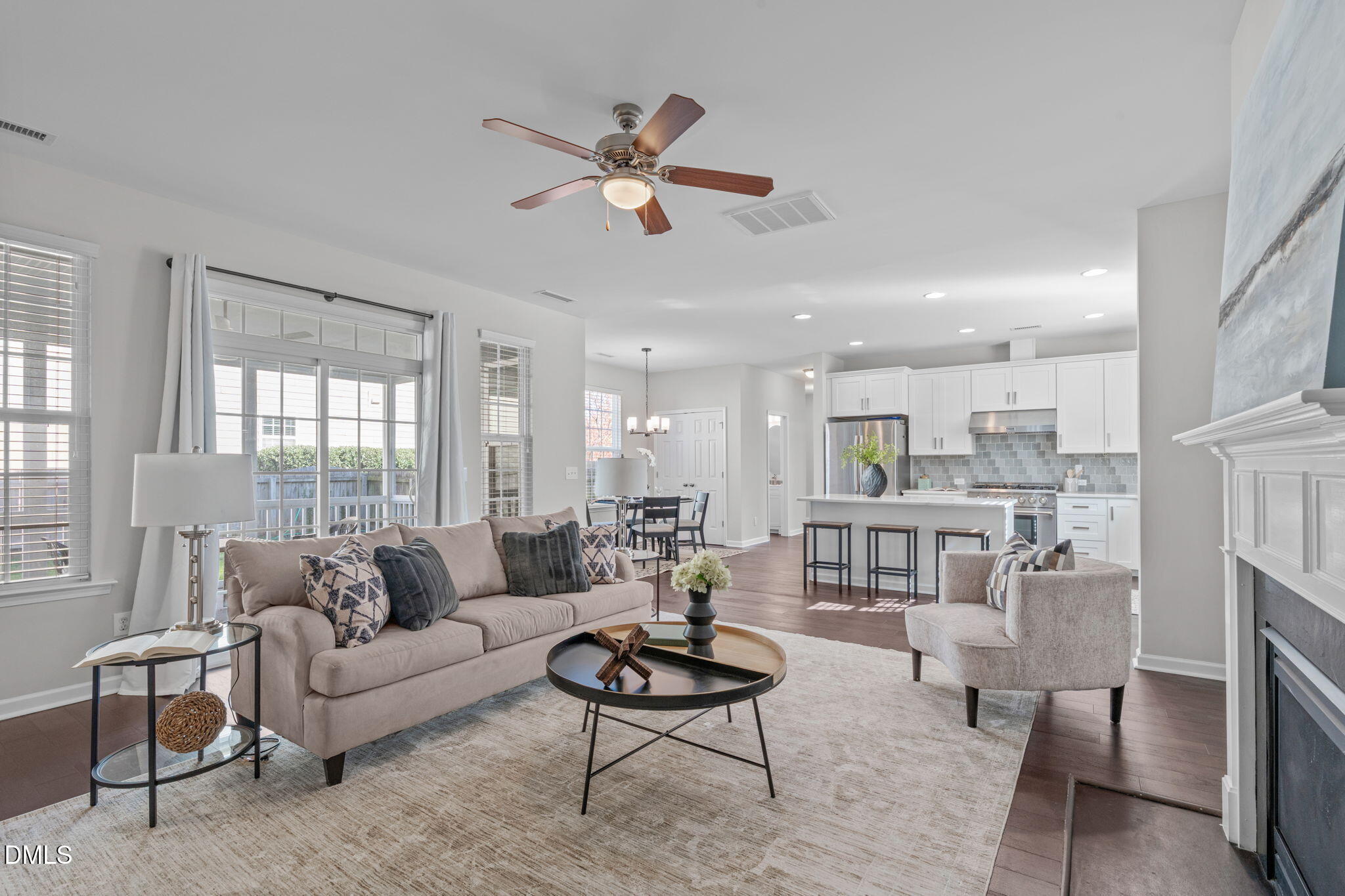 1432 Palace Garden Way Raleigh, NC 27603 - Photo 15 of 40 a living room with furniture kitchen view and a large window