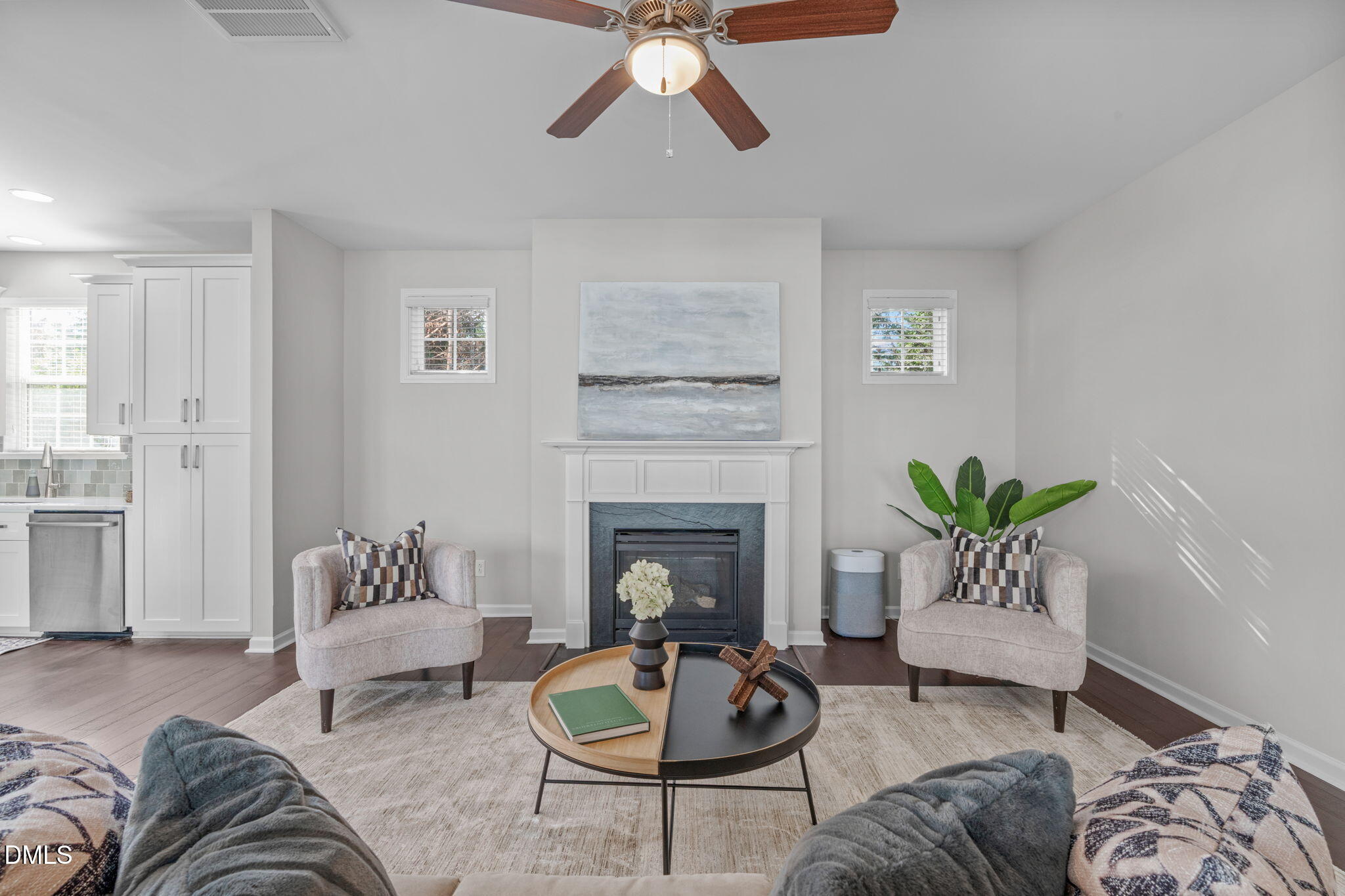 1432 Palace Garden Way Raleigh, NC 27603 - Photo 16 of 42 a living room with furniture and a fireplace