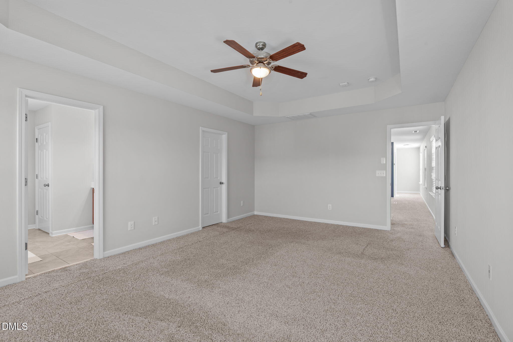 1432 Palace Garden Way Raleigh, NC 27603 - Photo 21 of 42 a view of an empty room with a ceiling fan
