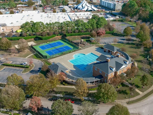 an aerial view of a house with a lake view