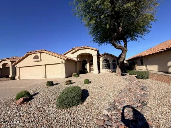 a view of a house with a snow in front of it