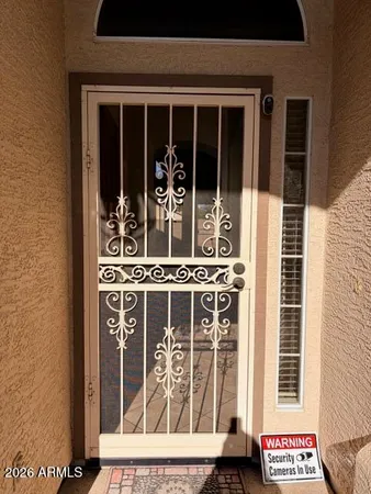 a front view of a house with glass windows