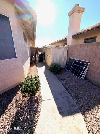 a bedroom with a bed and a table