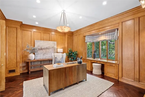 a bathroom with a sink toilet vanity and shower
