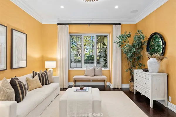 a bedroom with a large bed and a large window