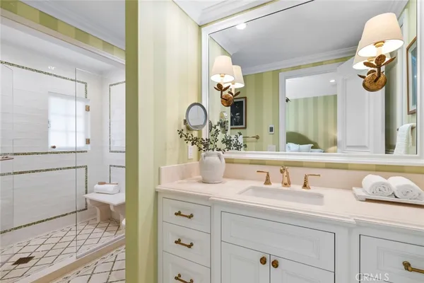 a view of a house with swimming pool and sitting area