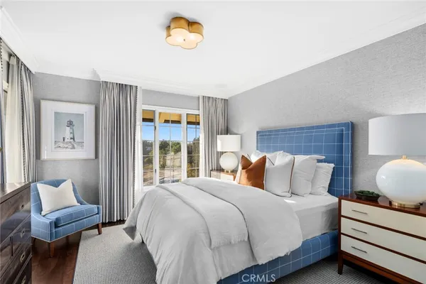 an aerial view of multiple houses with yard