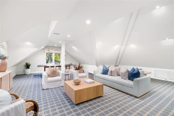 a view of a lake with a house in the background