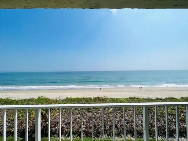 a view of an ocean from a balcony