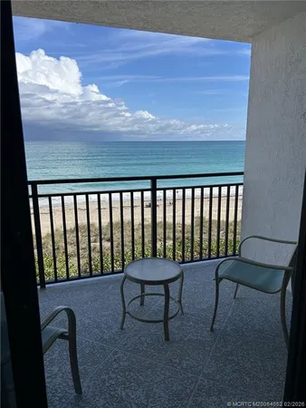 a view of a two chairs in the room