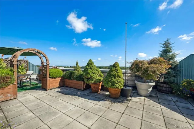 a building view with a garden space