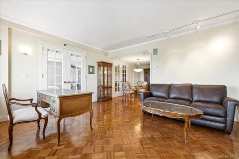 a living room with furniture and a table
