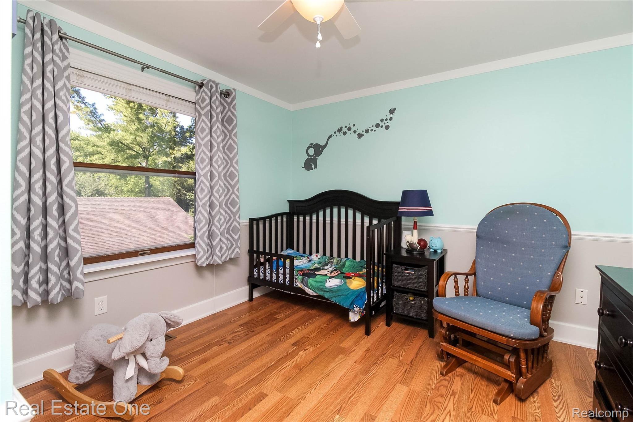 475 Grace Avenue Rochester, MI 48307 - Photo 29 of 58 3rd bedroom /Nursery with wood floor /ceiling fan