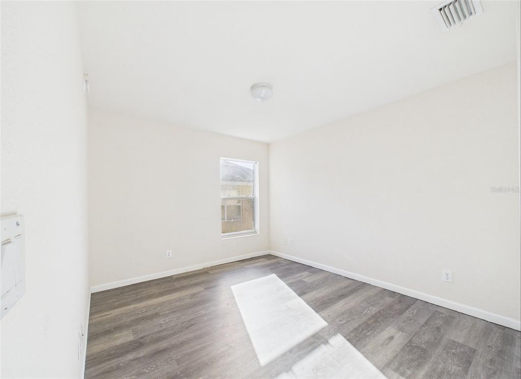 5208 Southwest 39th Street Ocala, FL 34474 - Photo 20 of 55 a view of an empty room