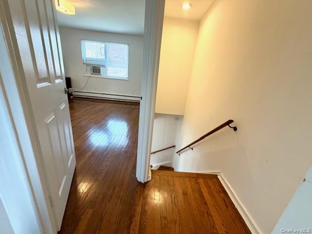 216-11 73rd Avenue, Unit DUPLEX Queens, NY 11364 - Photo 10 of 27 a view of a hallway with wooden floor