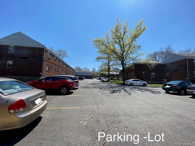 216-11 73rd Avenue, Unit DUPLEX Queens, NY 11364 - Photo 21 of 27 a view of a car parked in front of a house
