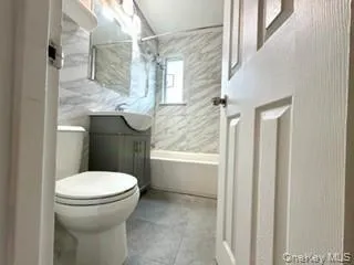 a bathroom with a sink and toilet
