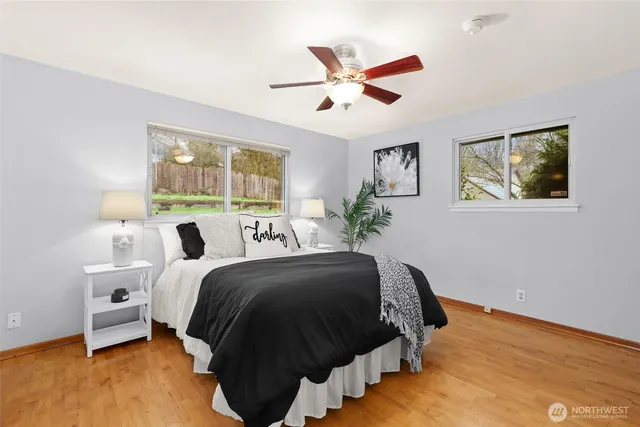 a bed room with a bed and a window