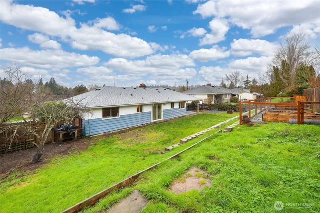 a view of a house with a big yard