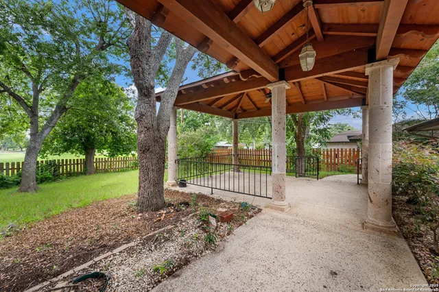 a view of a backyard with garden