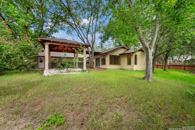 a house view with a garden space