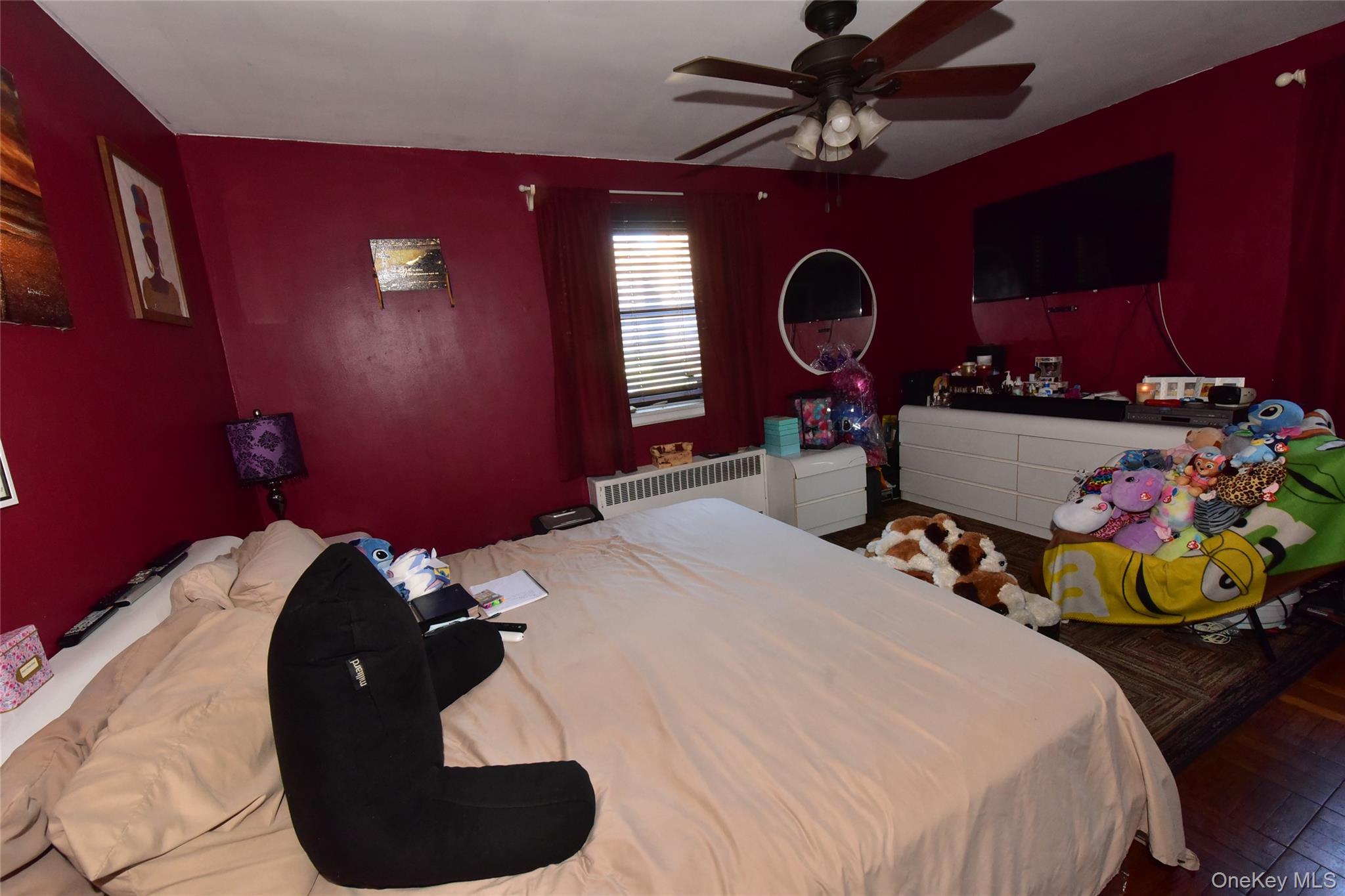 202-35 Foothill Avenue, Unit B24 Queens, NY 11423 - Photo 12 of 20 a bedroom with a bed and window