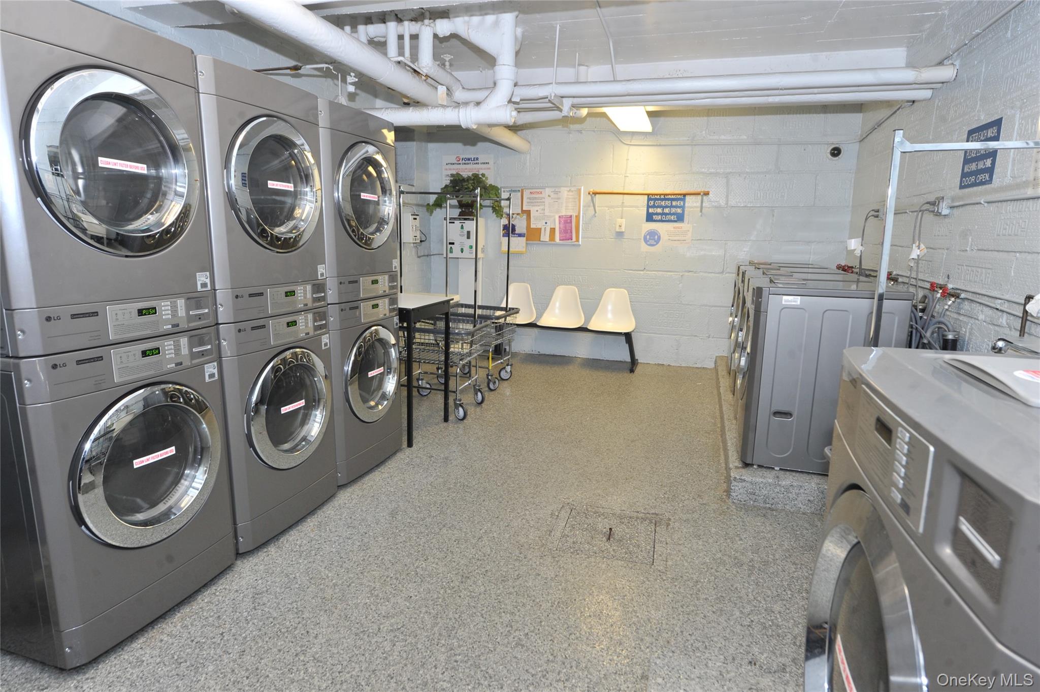 202-35 Foothill Avenue, Unit B24 Queens, NY 11423 - Photo 20 of 20 a utility room with dryer and washer