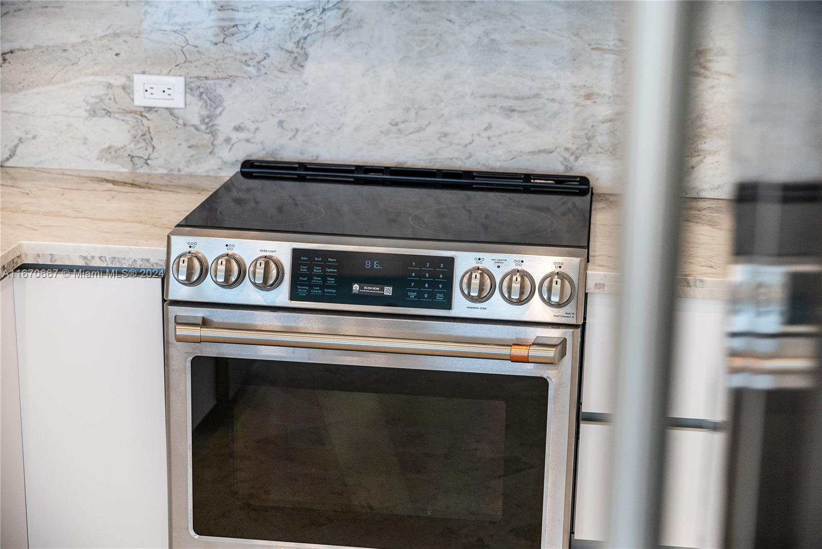 8855 Collins Avenue, Unit 5G Surfside, FL 33154 - Photo 28 of 41 a close view of washer and dryer