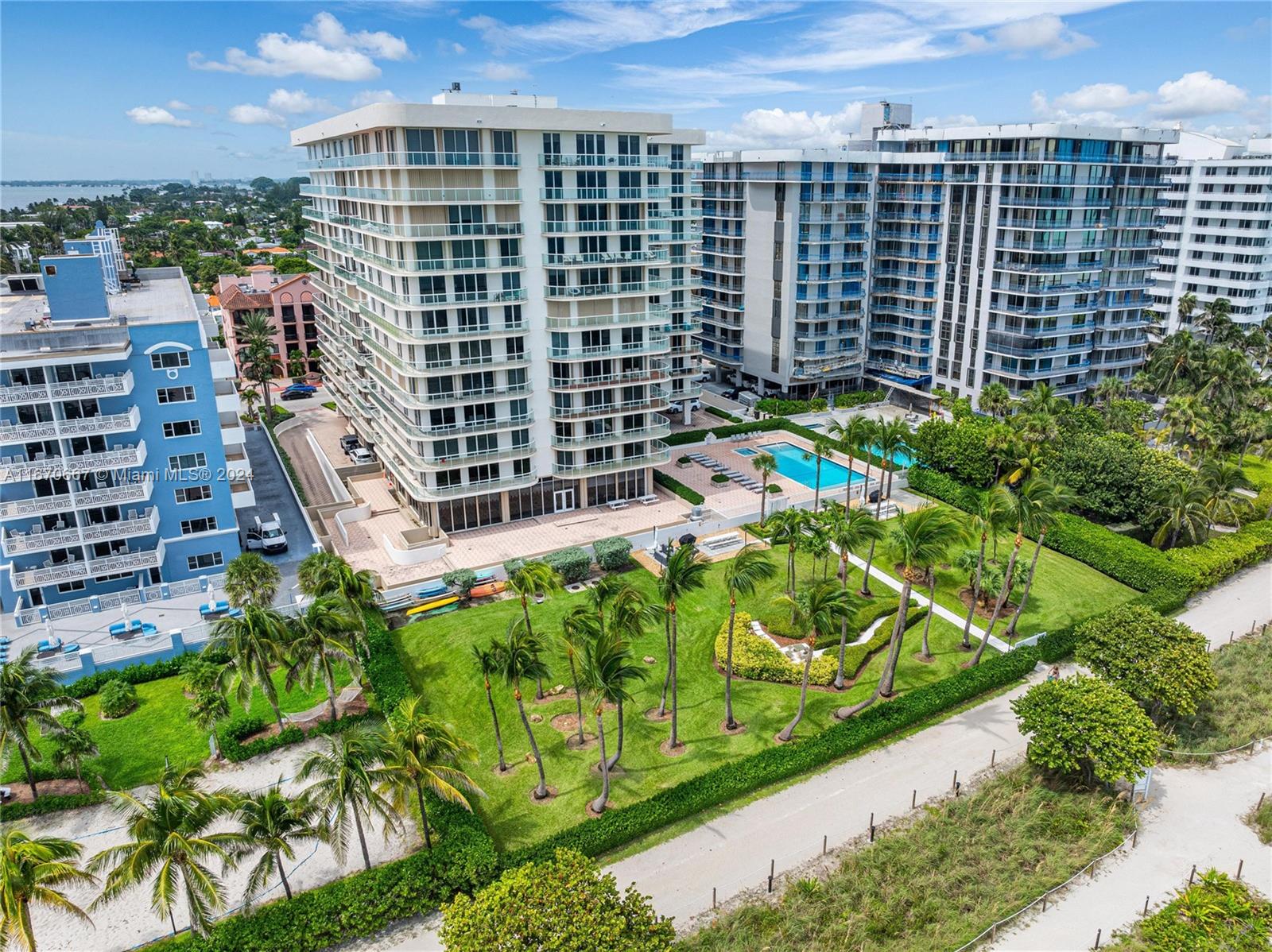 8855 Collins Avenue, Unit 5G Surfside, FL 33154 - Photo 31 of 41 an aerial view of multi story residential apartment building