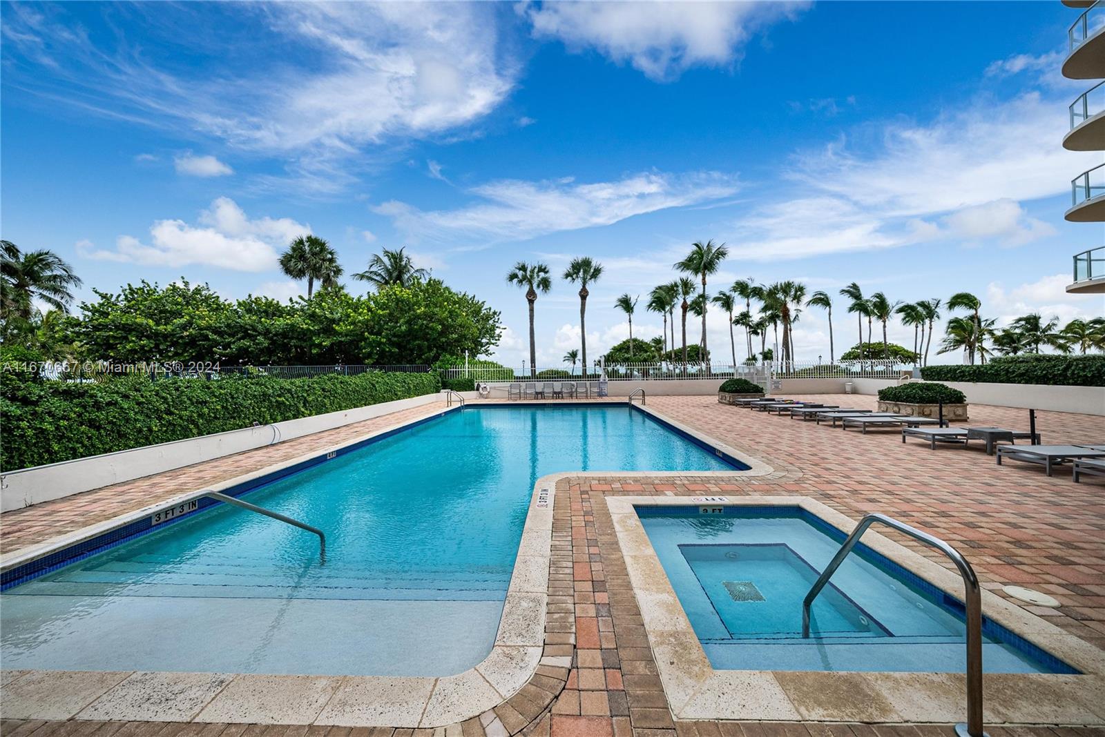 8855 Collins Avenue, Unit 5G Surfside, FL 33154 - Photo 32 of 41 a view of swimming pool from a balcony