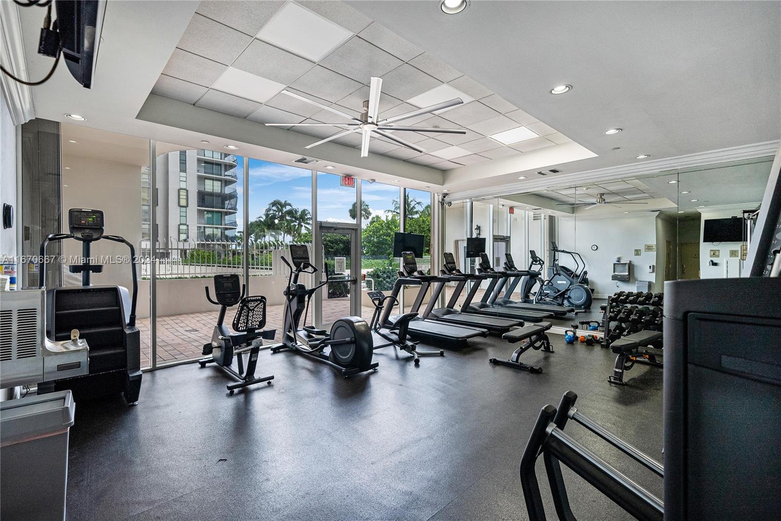 8855 Collins Avenue, Unit 5G Surfside, FL 33154 - Photo 36 of 41 a view of a room with gym equipment