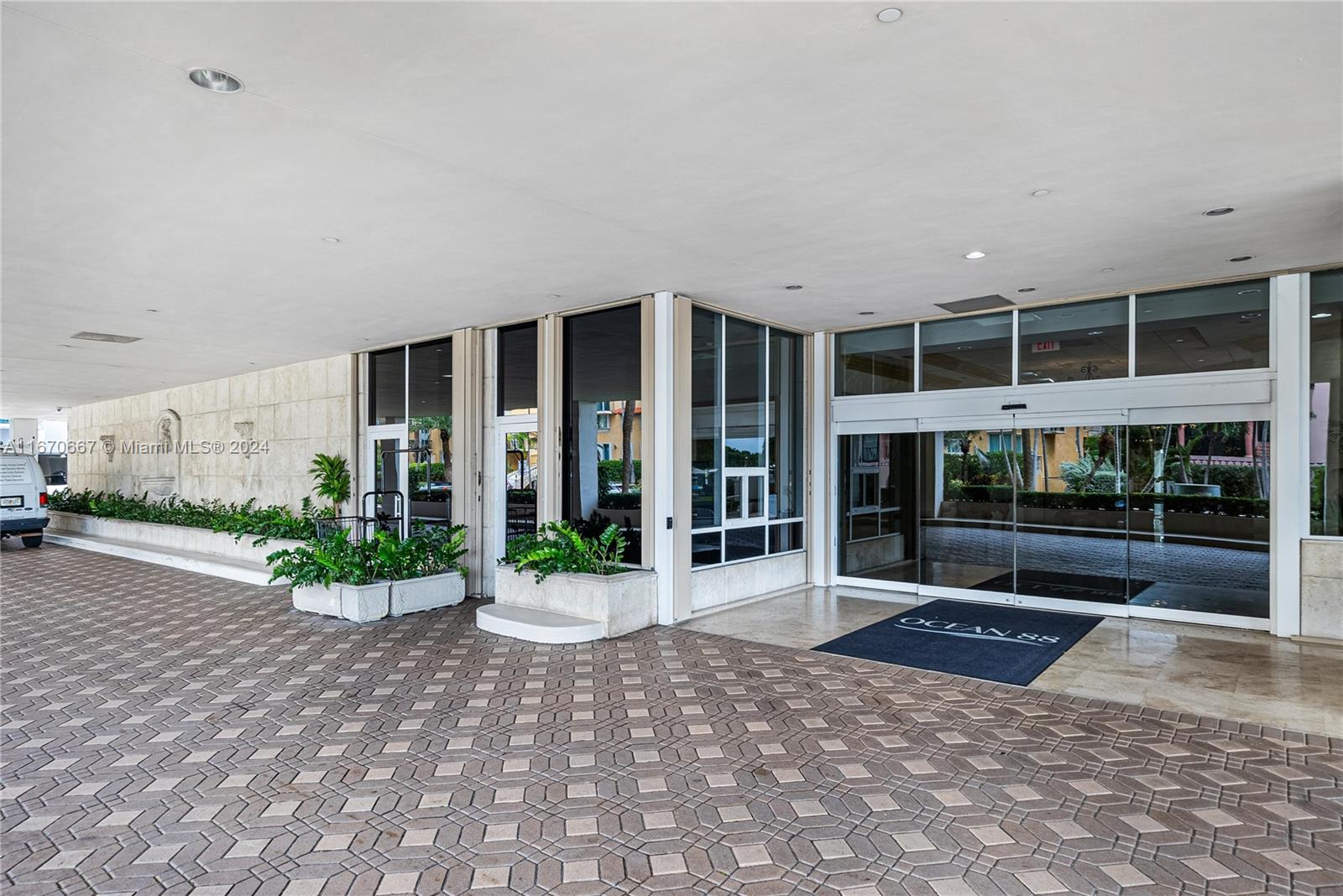 8855 Collins Avenue, Unit 5G Surfside, FL 33154 - Photo 37 of 41 a view of a building with a potted plant