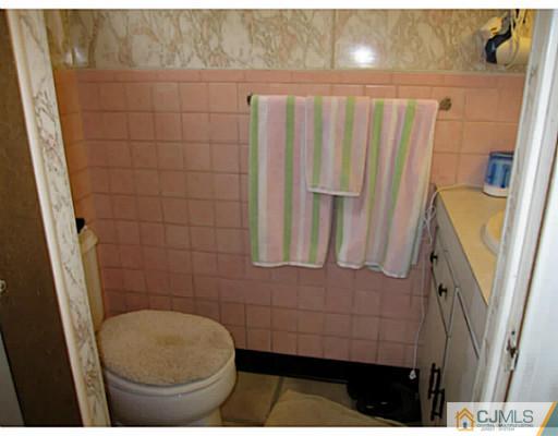 19 Wellesley Road Old Bridge, NJ 08859 - Photo 17 of 25 a bathroom with a toilet and a shower
