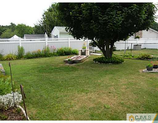 19 Wellesley Road Old Bridge, NJ 08859 - Photo 4 of 25 a front view of a house with garden