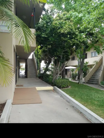 a view of a back yard of the house