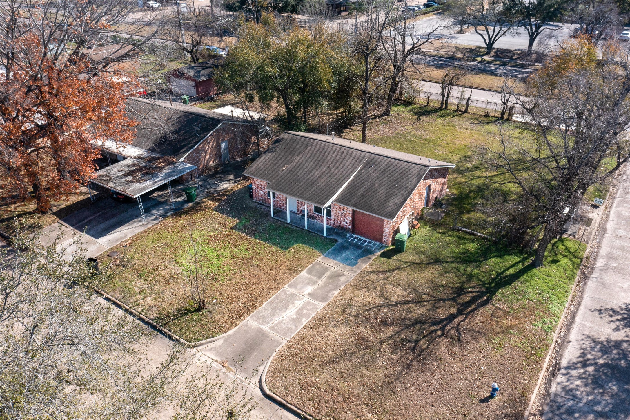 7115 Inkberry Drive Houston, TX 77092 - Photo 2 of 31 an aerial view of a house with a yard basket ball court and outdoor seating