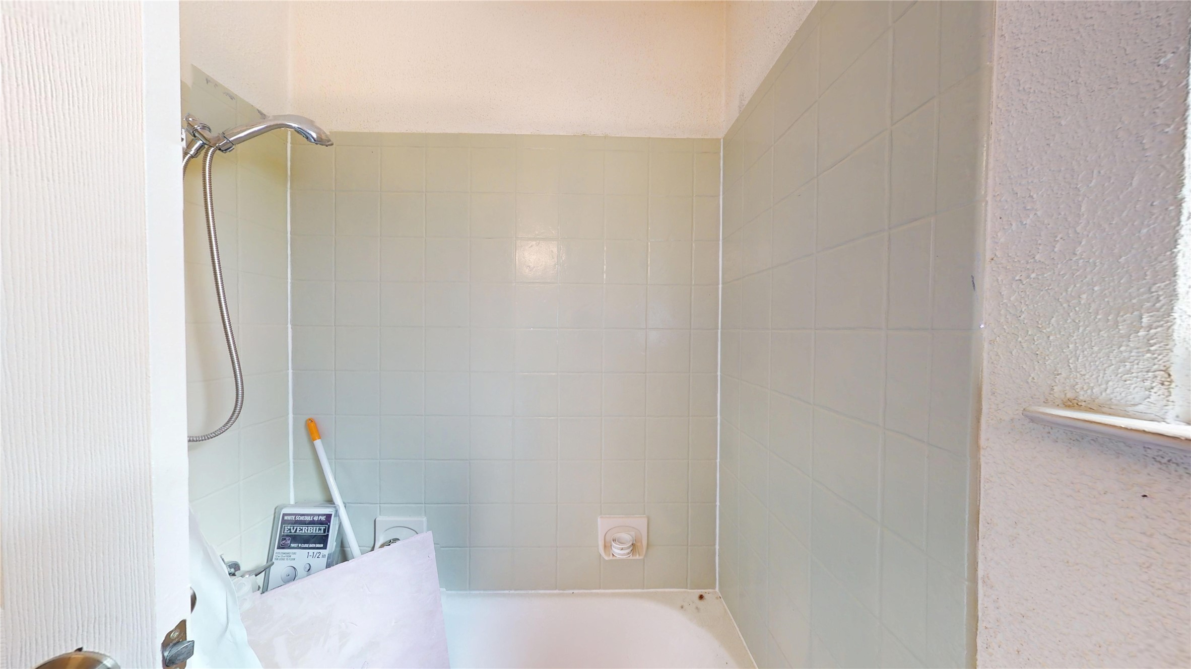 7115 Inkberry Drive Houston, TX 77092 - Photo 23 of 31 a bathroom with a sink and shower