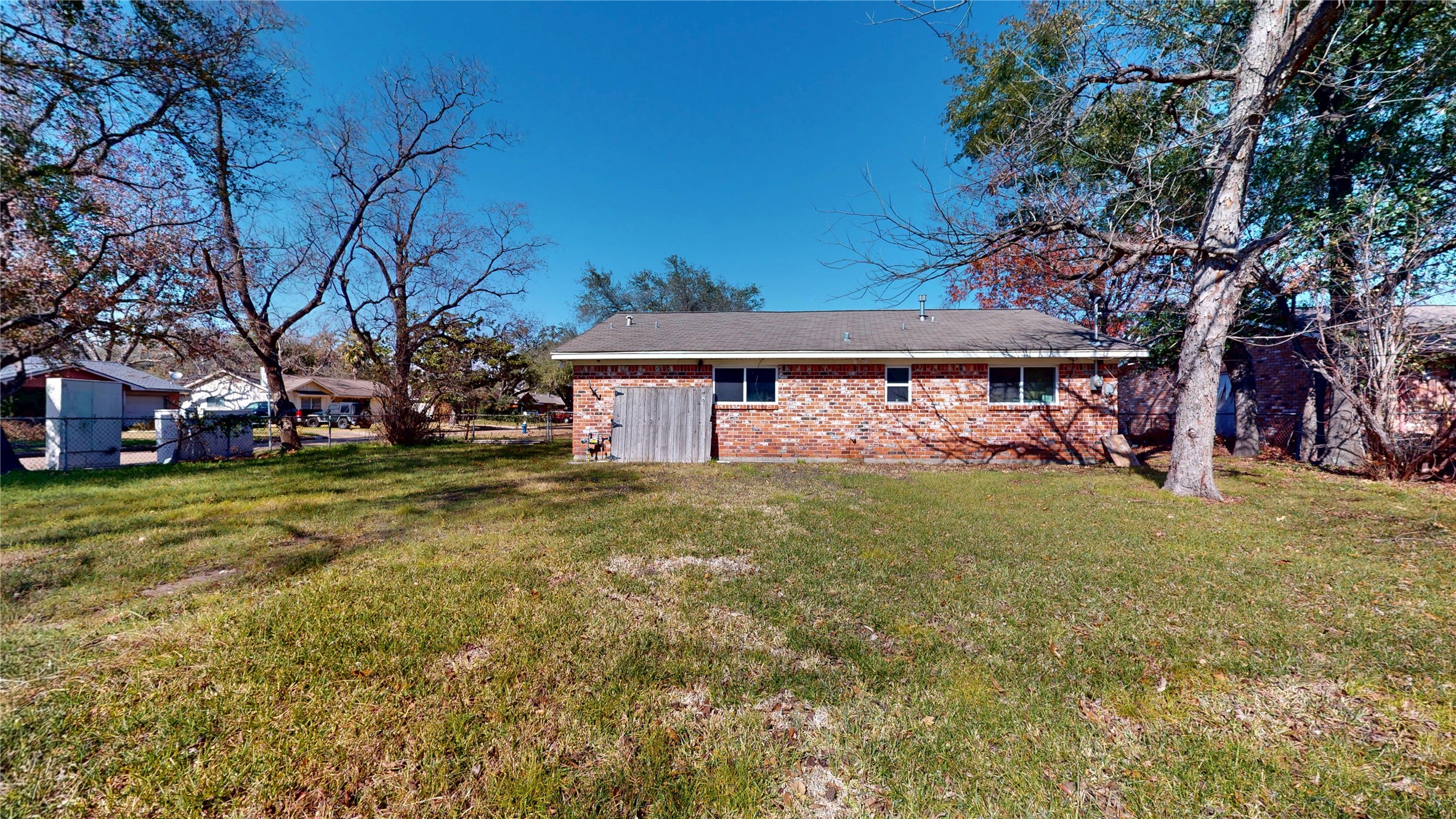7115 Inkberry Drive Houston, TX 77092 - Photo 31 of 31 a view of a house with a yard