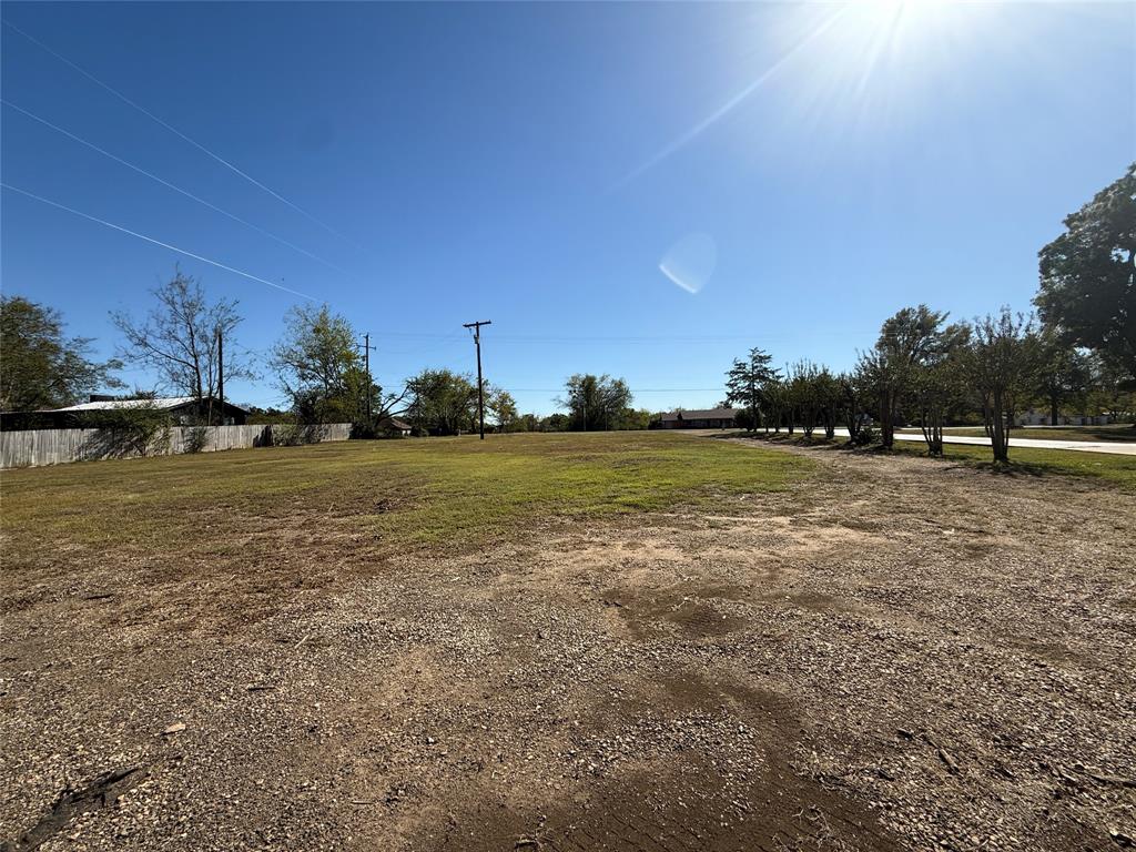 1813 Main Street Sulphur Springs, TX 75482 - Photo 13 of 14 a view of outdoor space with deck and trees