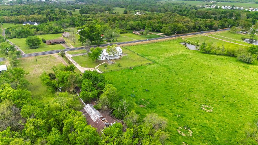 1813 Main Street Sulphur Springs, TX 75482 - Photo 10 of 14 an aerial view of residential houses with outdoor space and street view