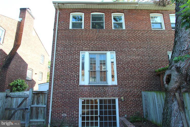 1214 Portner Road Alexandria, VA 22314 - Photo 19 of 21 a front view of a house with a yard