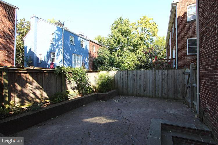 1214 Portner Road Alexandria, VA 22314 - Photo 6 of 21 a view of a street with a building in the background