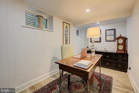a view of a workspace with furniture