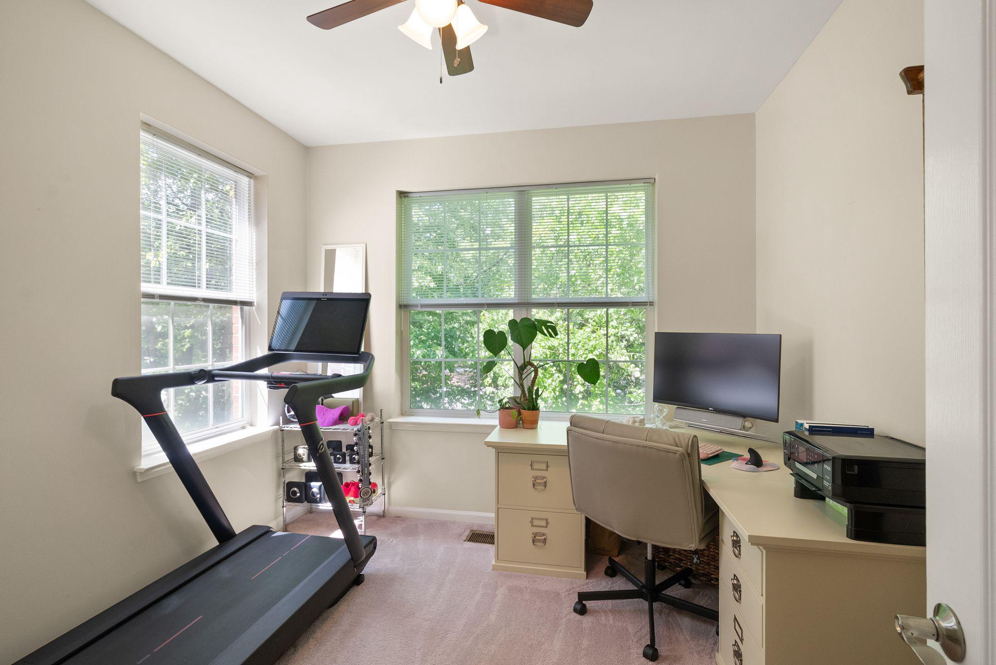 12414 A Liberty Bridge Road Fairfax, VA 22033 - Photo 27 of 38 a view of a workspace with furniture and a window