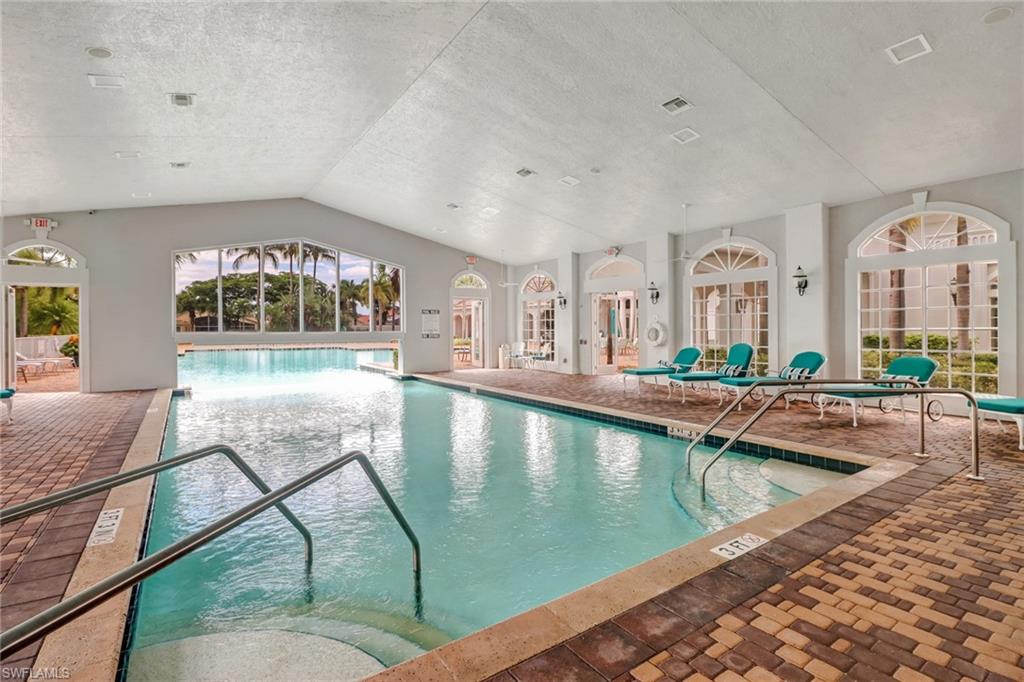 9312 Sun River Way Estero, FL 33928 - Photo 40 of 45 a view of a living room and kitchen
