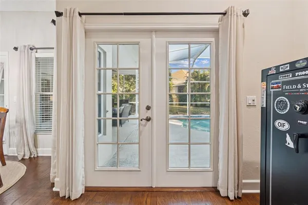 a kitchen with stainless steel appliances granite countertop a stove top oven a sink and dishwasher