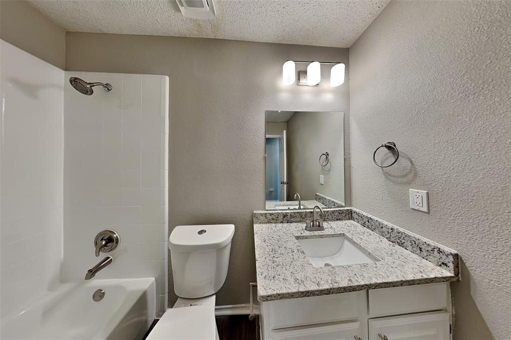 3304 Athens Drive Corinth, TX 76210 - Photo 18 of 22 a bathroom with a sink toilet and shower
